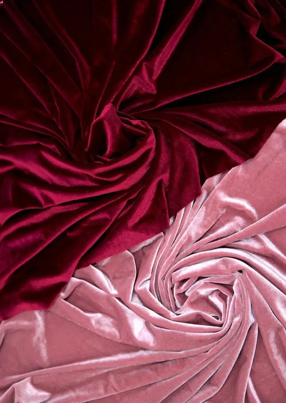 Deep-coloured velvet stage curtain fabric with a plush, light-absorbing pile.