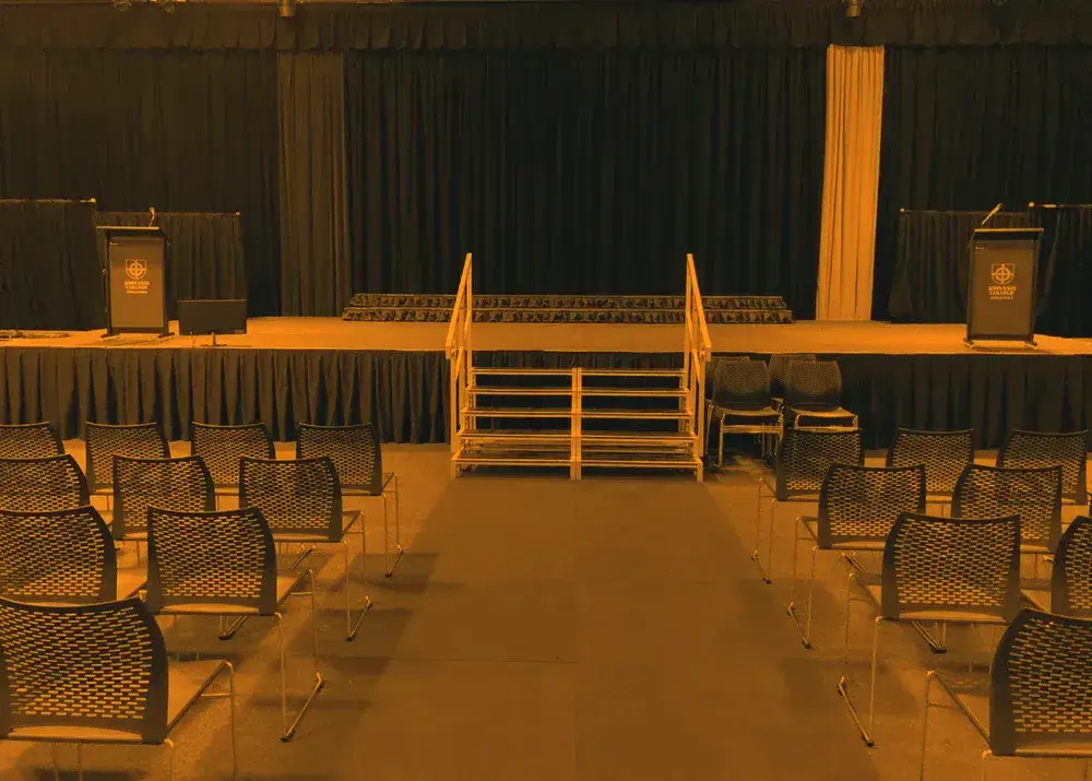School hall stage fitted with house curtain, masking and stage skirting by TSA