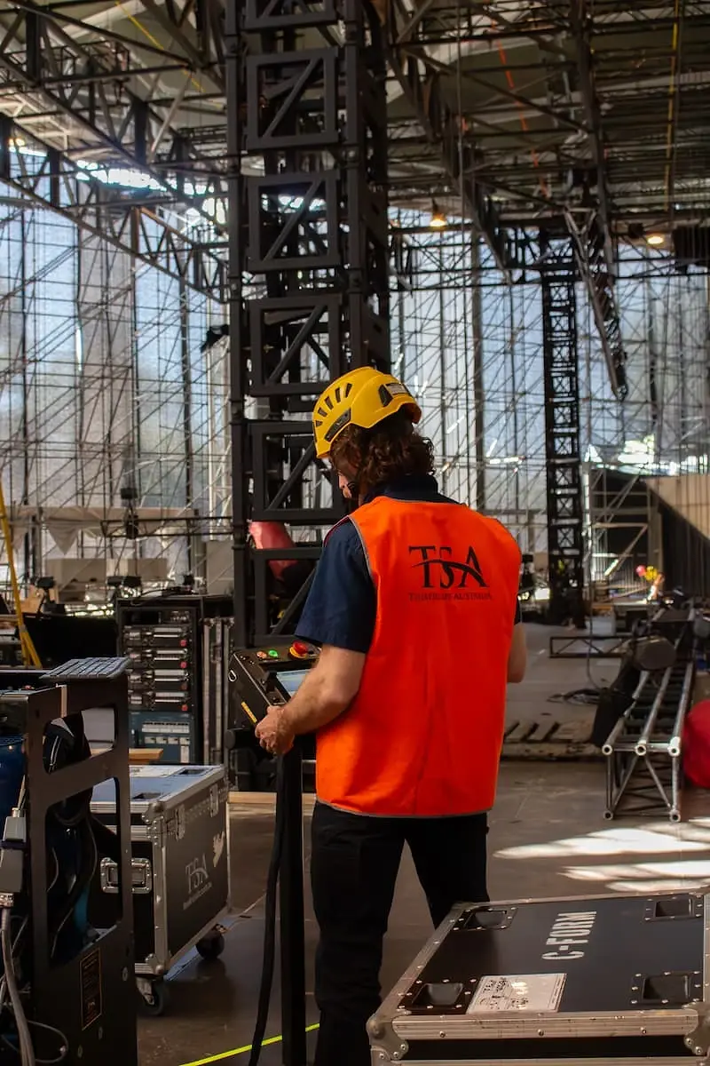 Production show scene with overhead rigging in use