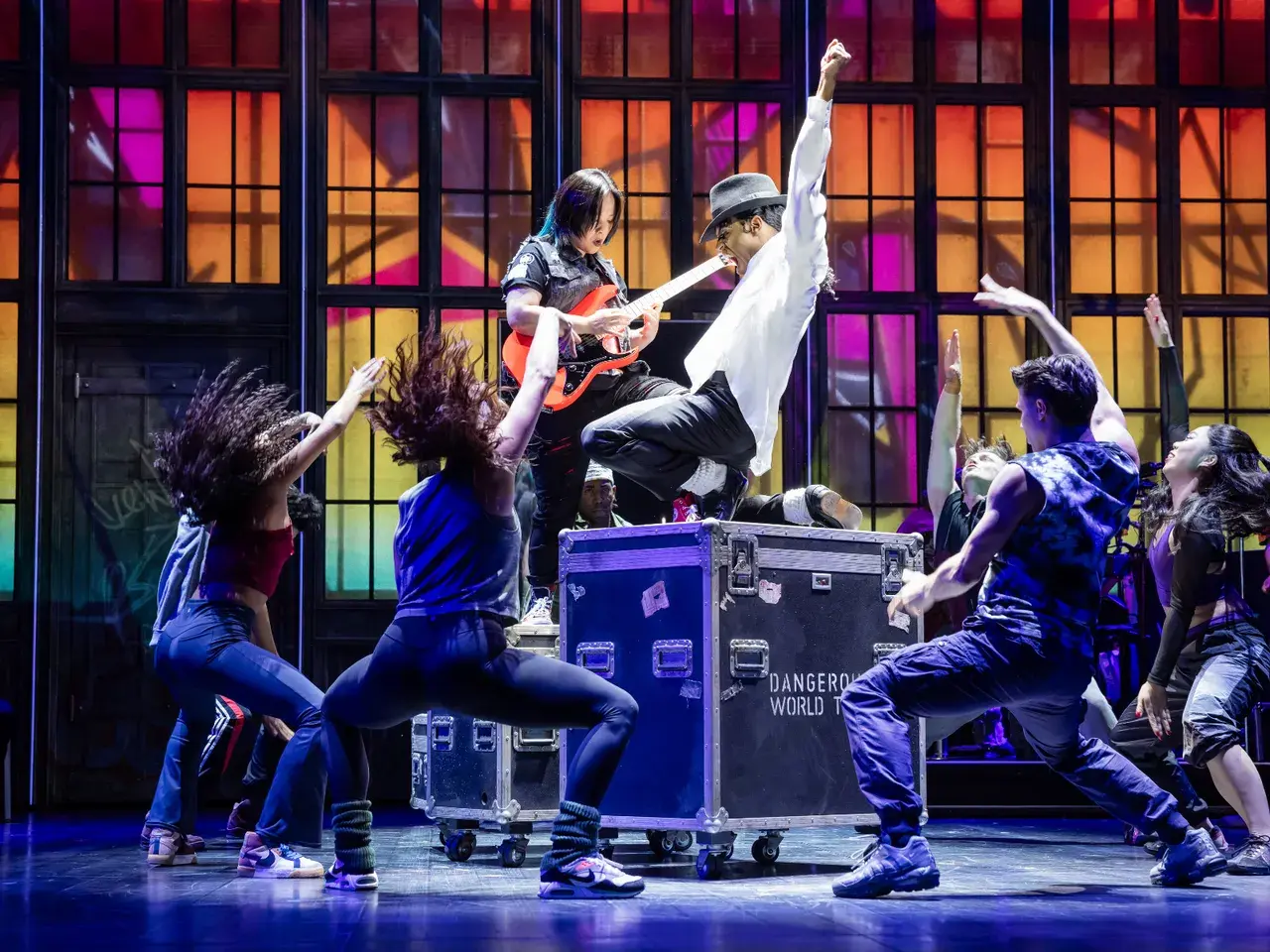 MJ The Musical Australian cast on stage in the neon disco number. Photo by Daniel Boud.