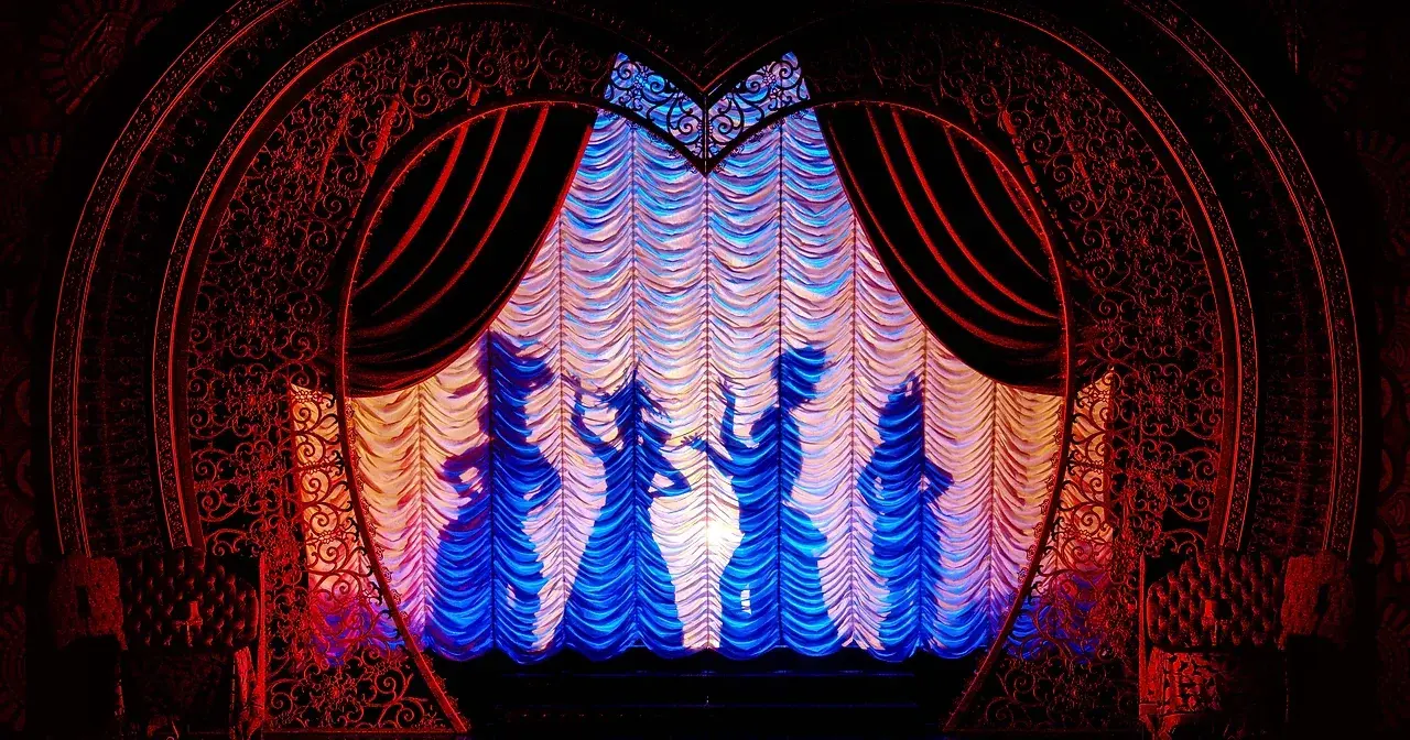 The Lady Ms in performance, set dressed with Reveal soft goods. Photo: Michelle Grace Hunder.